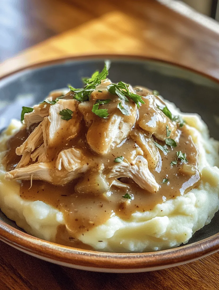 Savory Shredded Chicken with Creamy Gravy Over Mashed Potatoes